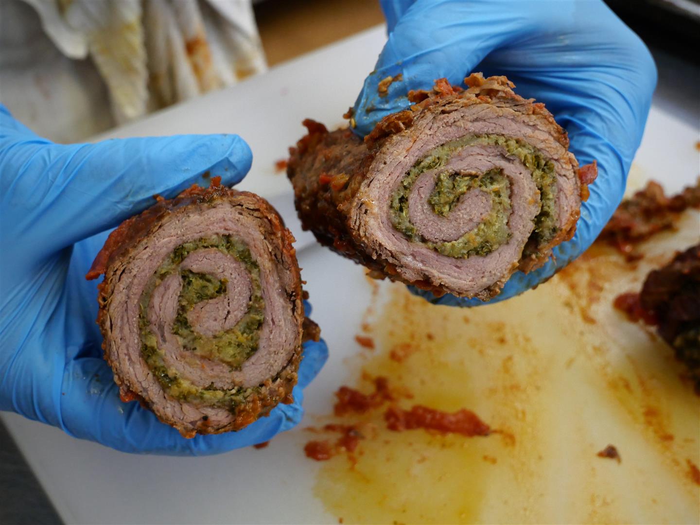 Braciole - beef braised in tomato sauce and filled with veggies