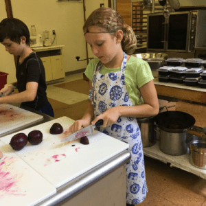 Young volunteers were an early part of our kitchen - now you'll need to be 13 or older because of how fast everything moves!