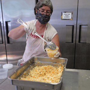 Masks didn't stop volunteers from preparing delicious meals in the kitchen.