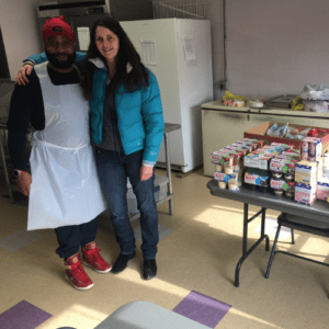 Martha at the Peekskill Salvation Army with the food for the week.