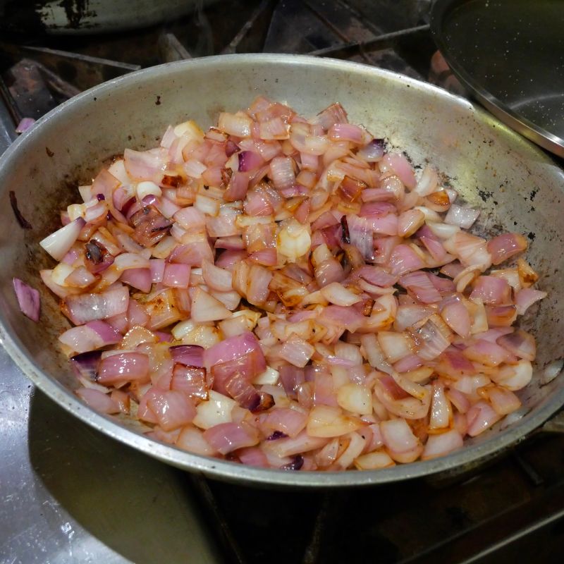onions in a pan starting to brown