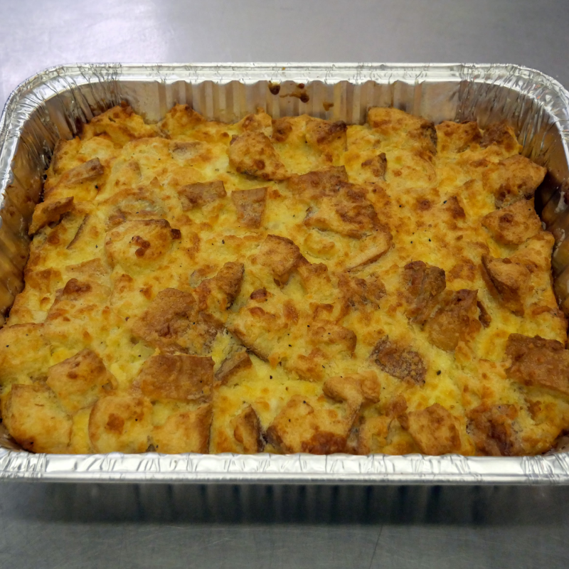 a silver baking dish filled with a cooked strata